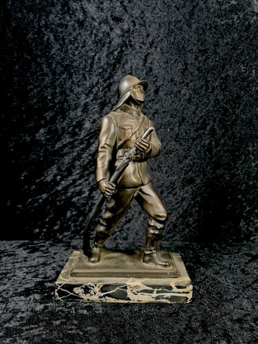 Bronzefigur feuerwehrmann - bronzefigur,